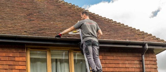 our team cleaning the gutters on a house in Stoke Bishop, Sandy